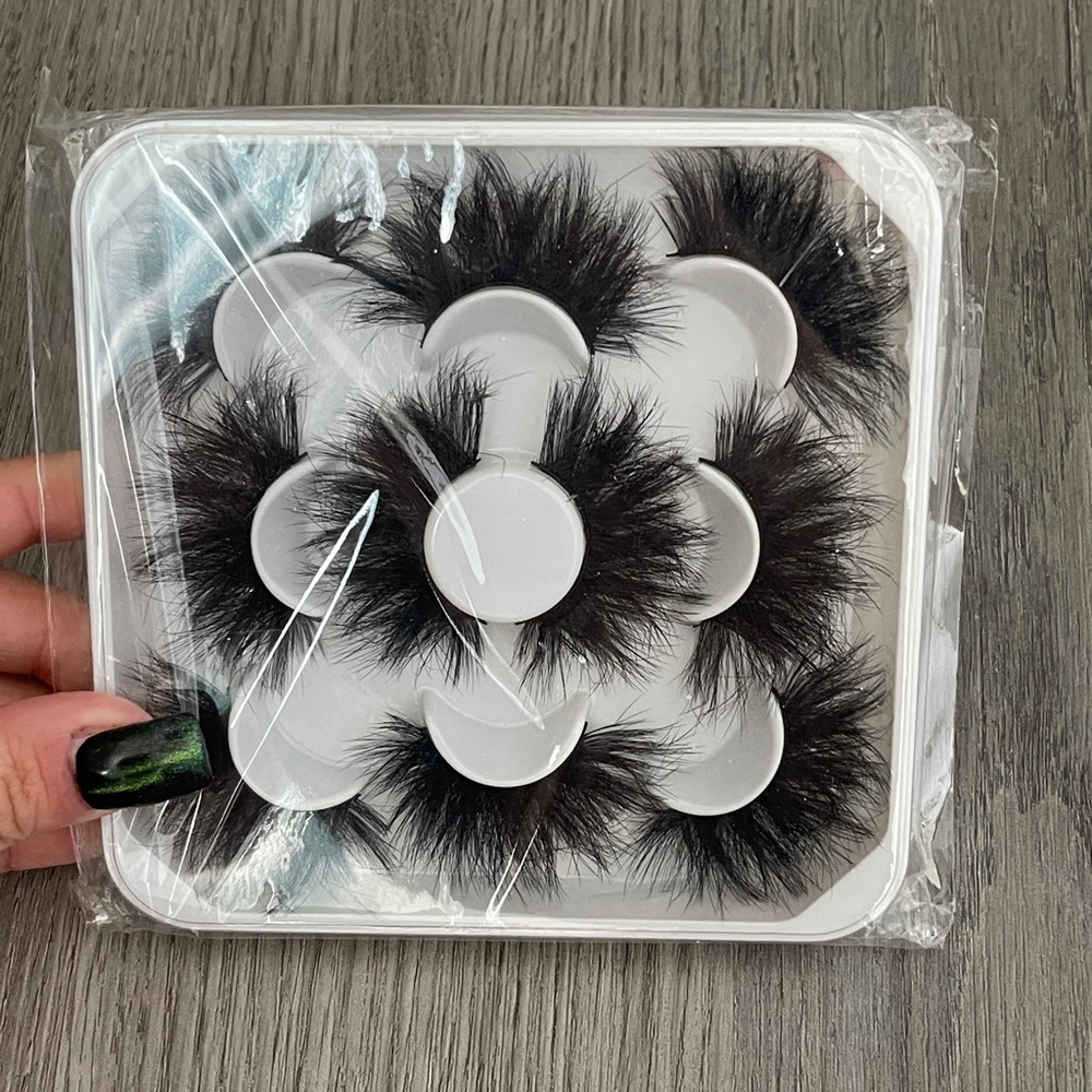 Brand new extra long and voluminous black lashes. Faux Mink. 5 pairs.